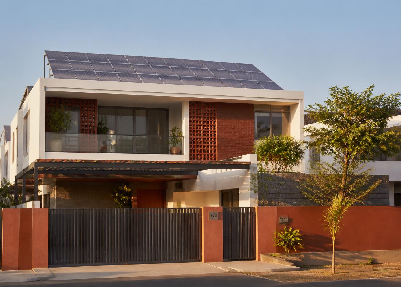 Contemporary home with rooftop solar panels